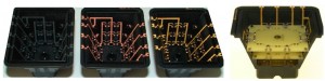 Das mit LPKF-LDS®- Technologie hergestellte Gehäuse (links) und über die Höhe verteilten Bestückungsebenen eines energieautarken Drucksensors (rechts). Quelle:  BMBF Verbundvorhaben IEKU (V3EAAS010).